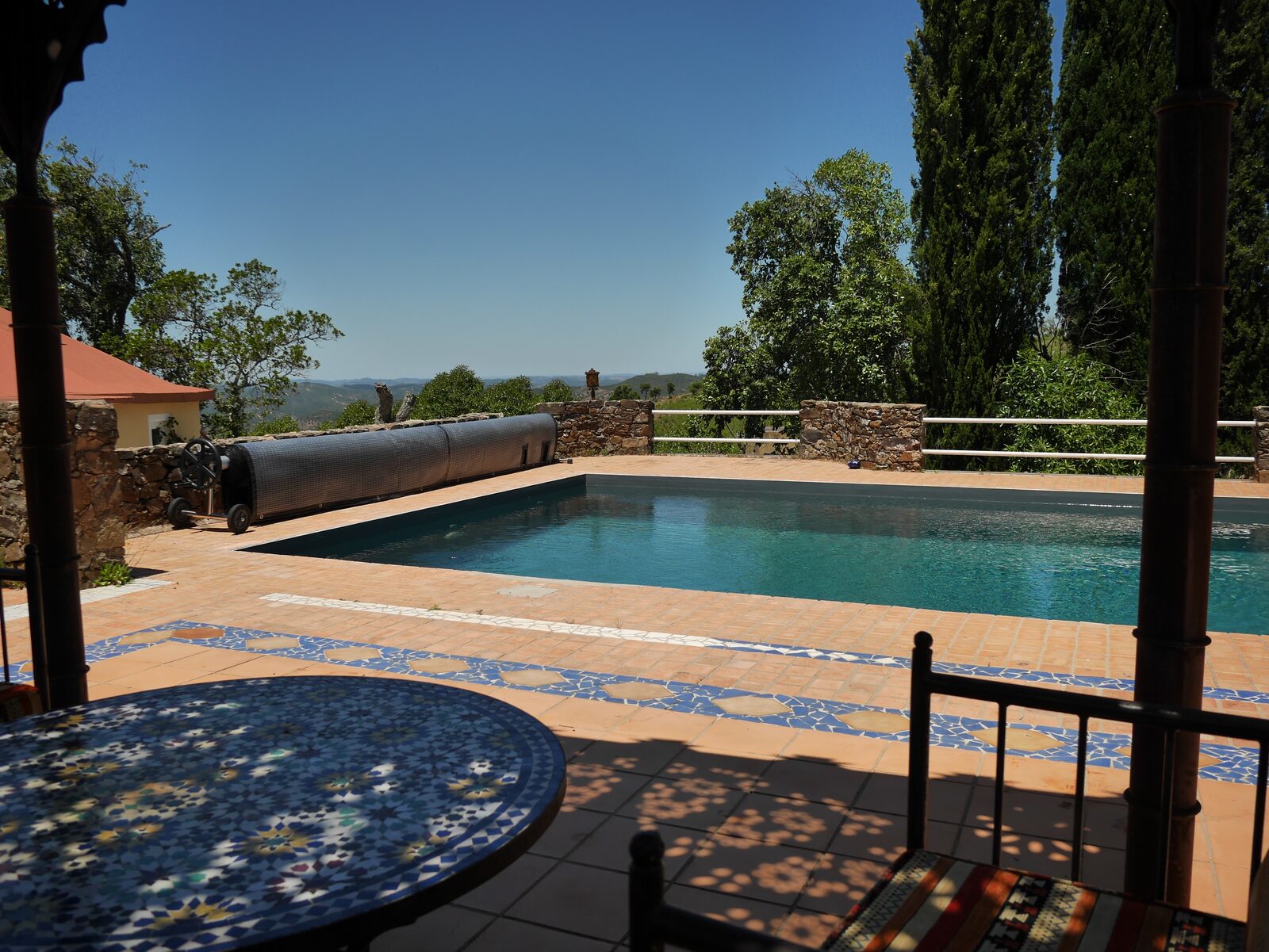 Pool surrounded by gardens
